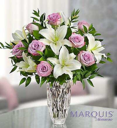 Lavender roses and white Lily Bouquet in an elegant large vase
